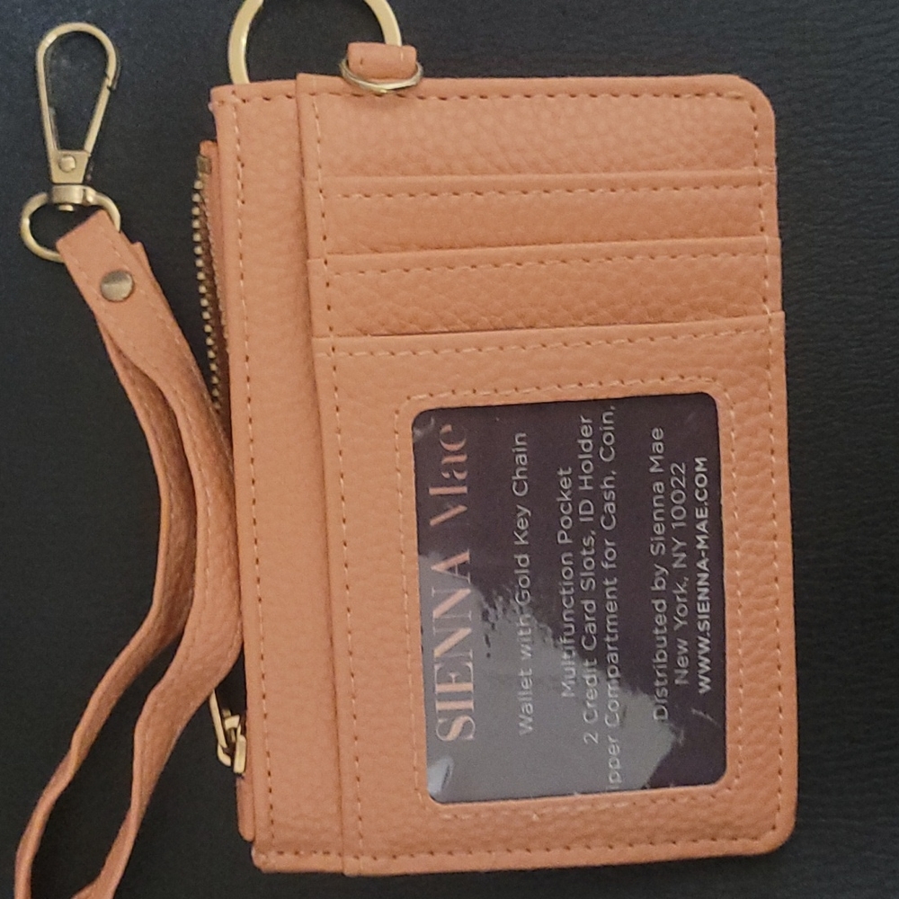 Wallet with key chain and wrist band